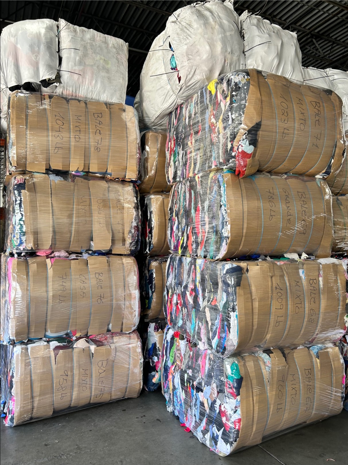 Sorted clothing bales ready for export