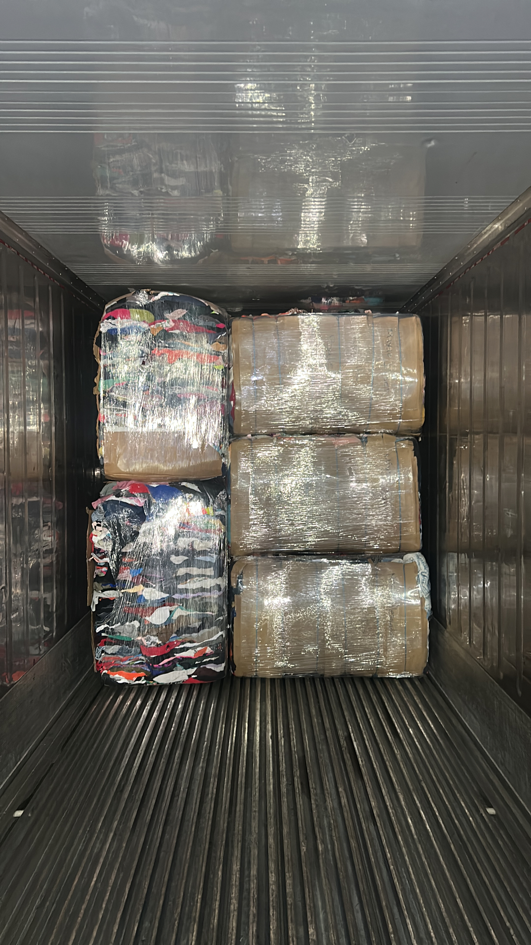 1,000 lb mixed clothing bales loaded in a container